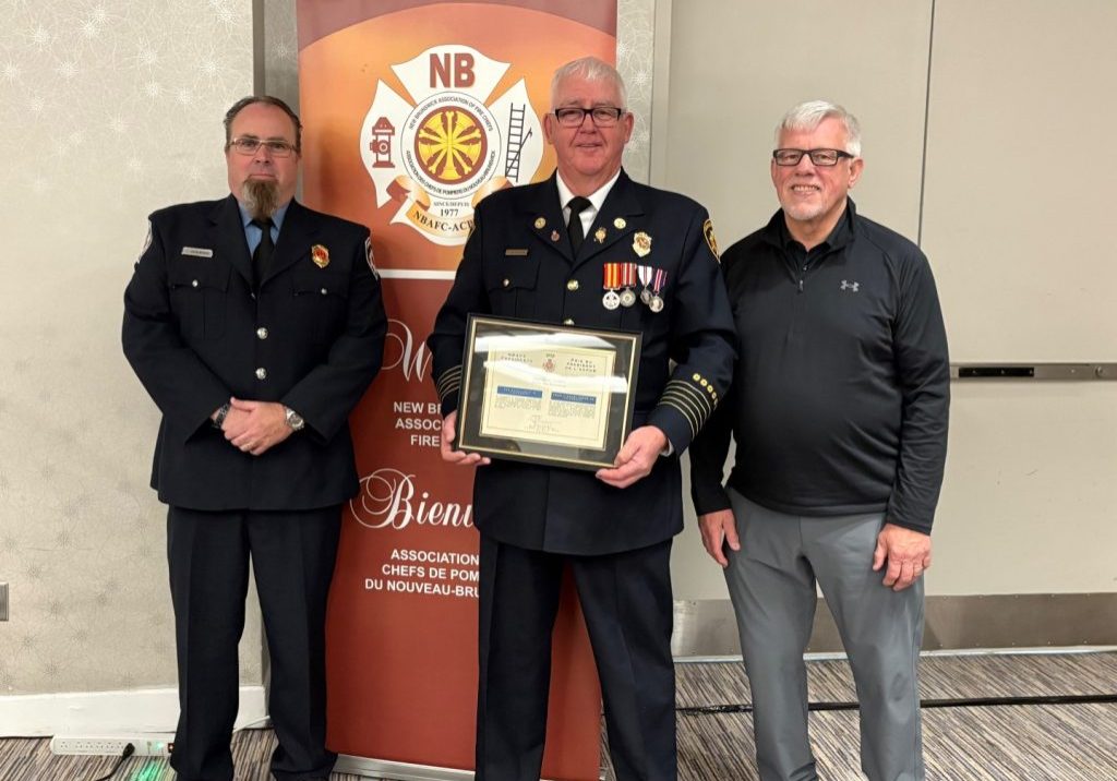 Dan MacVicar, Dwain Hallihan and Kevin E. Russell