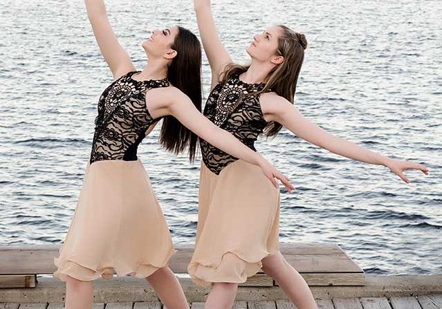 Anna Sturgeon and Abby Keenan on the Miramichi waterfront, photo by Vanessa Hutt Berzak.